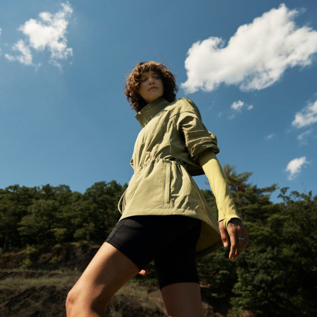 model in green jacket