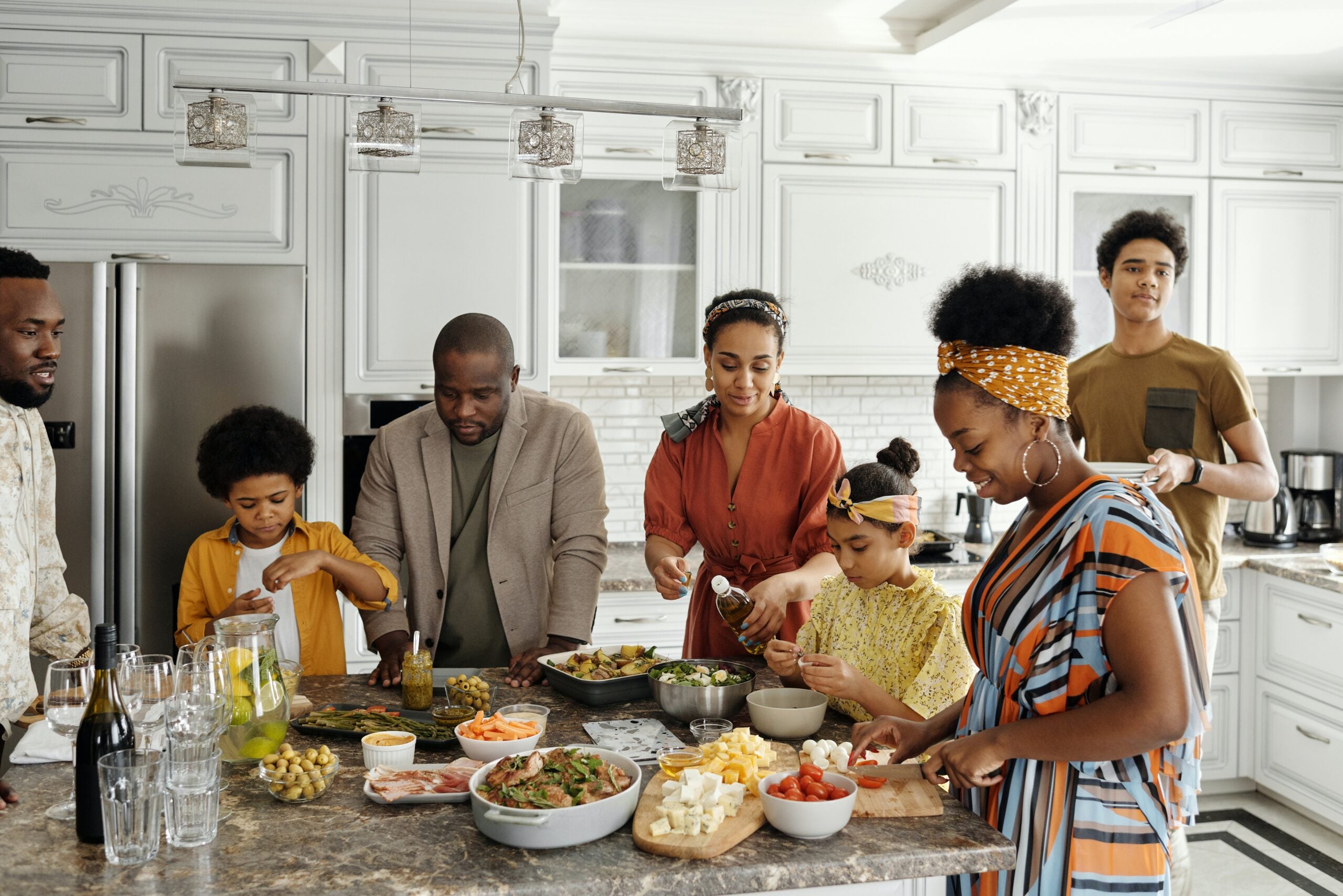 family prepping dinner